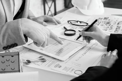 businessmen-analyzing-business-plan-tablet b y n businessmen-analyzing-business-plan-tablet b y n